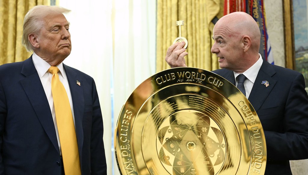 FIFA President Gianni Infantino, right, presents President Donald Trump with a key to unlock the new FIFA Club World Cup trophy in the Oval Office of the White House, March 7, 2025. (AP)